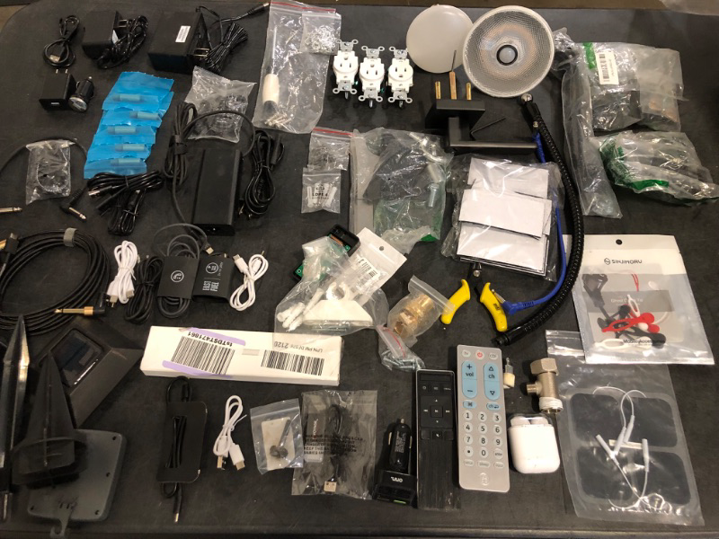 Photo 1 of Sold as Is Random Charger/Home Improvement/ Nails and Tools Bundle