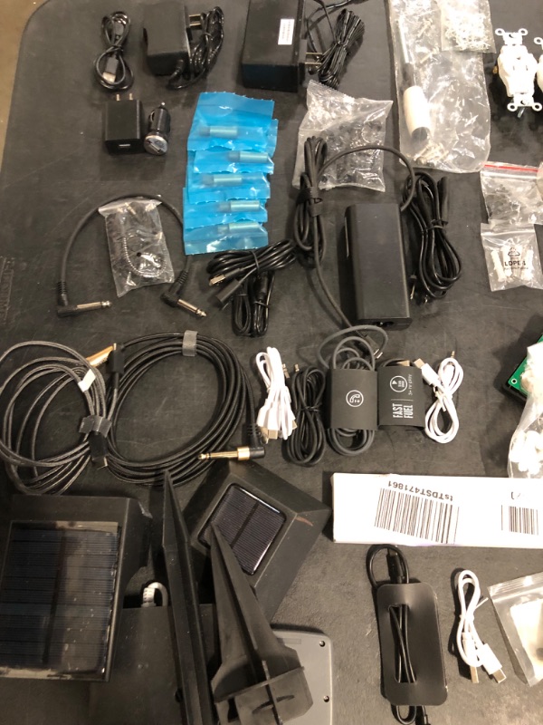 Photo 1 of Sold as Is Random Charger/Home Improvement/ Nails and Tools Bundle