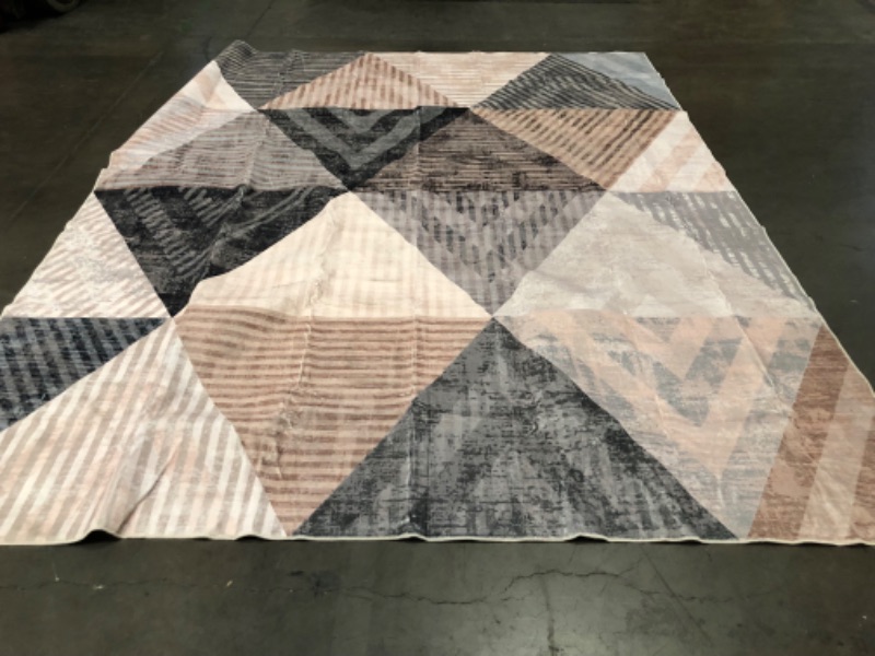 Photo 1 of Living Room Rug with Grey,White and Pink Triangles 160cmX200cm