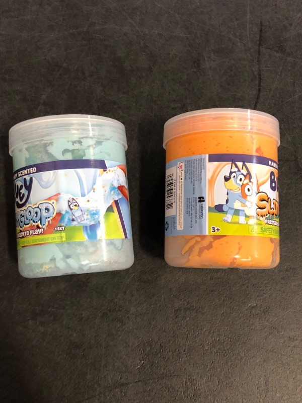 Photo 1 of Bluey SLIMYLGOOP, 2 Pack, Pre-Made Slimes, Ready to Play Scented Bluey Cloud Slimes, Includes Rubber Bluey Charm & Bingo Charm