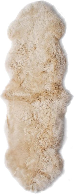 Photo 1 of Real Sheepskin Rug 2x6 ft | Sheepskin Rugs for Living Room and Sofa | Bedside Rugs for Bedrooms | Large Fluffy Rug is Breathable & Heat-regulating in Color Beige