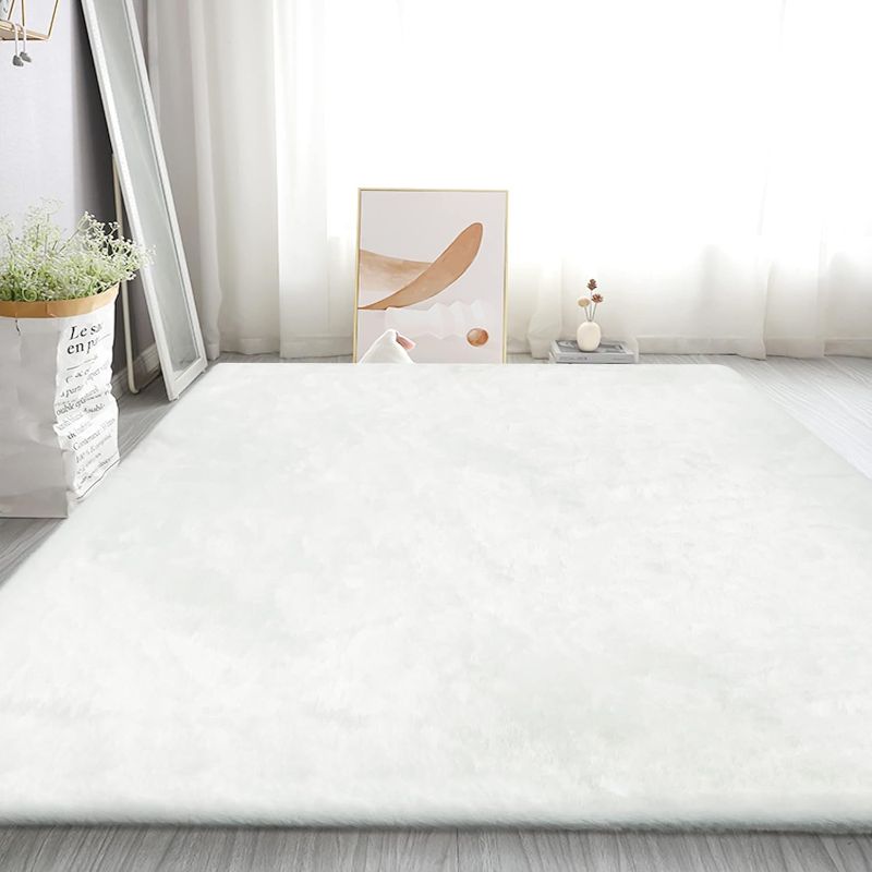 Photo 1 of Soft White Fluffy Area Rug Faux Rabbit Washable Fur Rugs for Bedroom, White Fuzzy Living Room Carpets Indoor Modern Shag Area Rugs for Children Bedroom Nursery Playroom Home Decor Rug