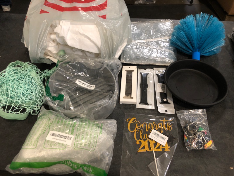 Photo 1 of Random Miscellaneous Bundle Sold as Is ** Includes Apple Watch Bands , Sheets, Home Cooking Appliances, Keychains and More.