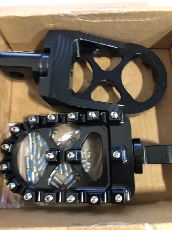 Photo 1 of StarknightMT CNC Wide Fat Footpegs 360° Roating MX Foot Pegs Chopper Bobber Style Compatible with Dyna Fatboy Sportster Iron 883 (Black)