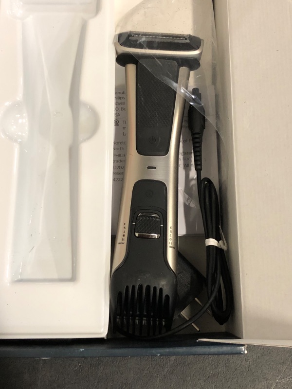 Photo 1 of Philips Norelco Bodygroom 7000 Series, Showerproof Groin and Body Trimmer for Men, Precise Body Grooming, Adjustable Comb, Safe Even Below The Belt, 80 Min. Runtime, Model BG7030/49