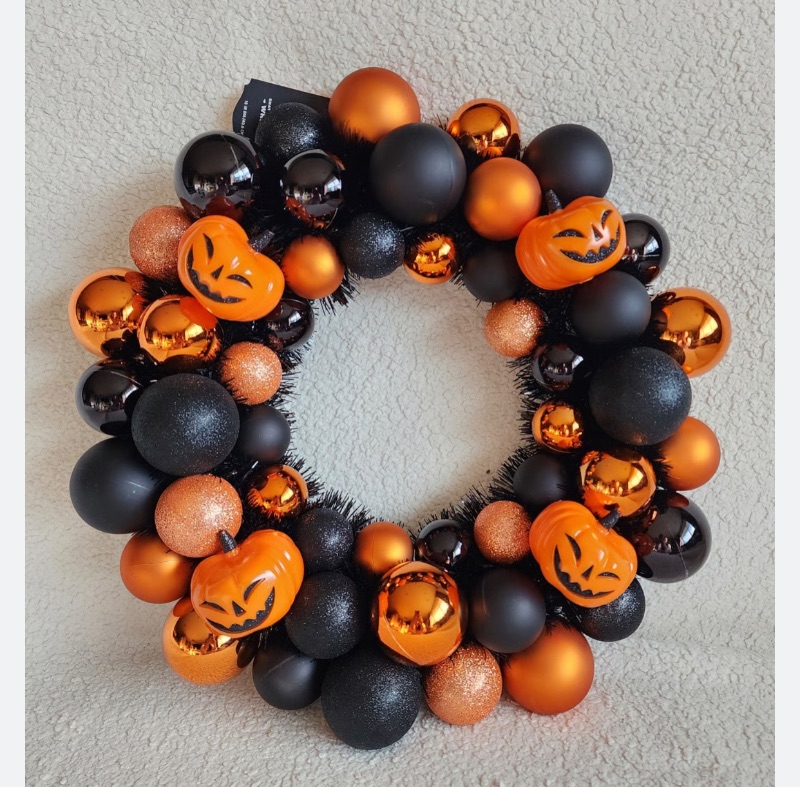 Photo 1 of Hyde and EEK Halloween Wreath with Pumpkin Baubles, featuring Black and Orange Shatterproof Bulbs and Pumpkin Shaped Ornaments
