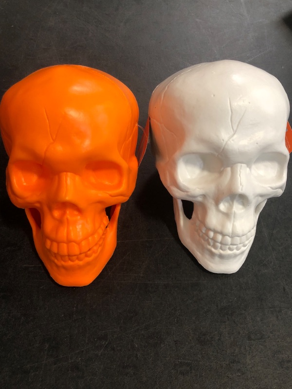 Photo 1 of Hyde and EEK Indoor/ Outdoor Skull Head Decorations 2 Pack, Orange and White