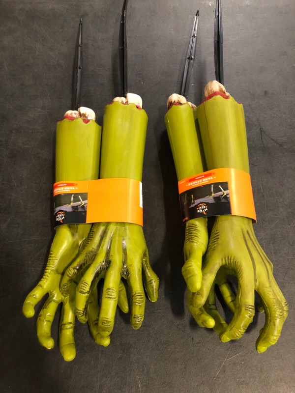 Photo 1 of Hyde and EEK Zombie Hand Yard Stakes Outdoor Halloween Decor (4 Hands) 