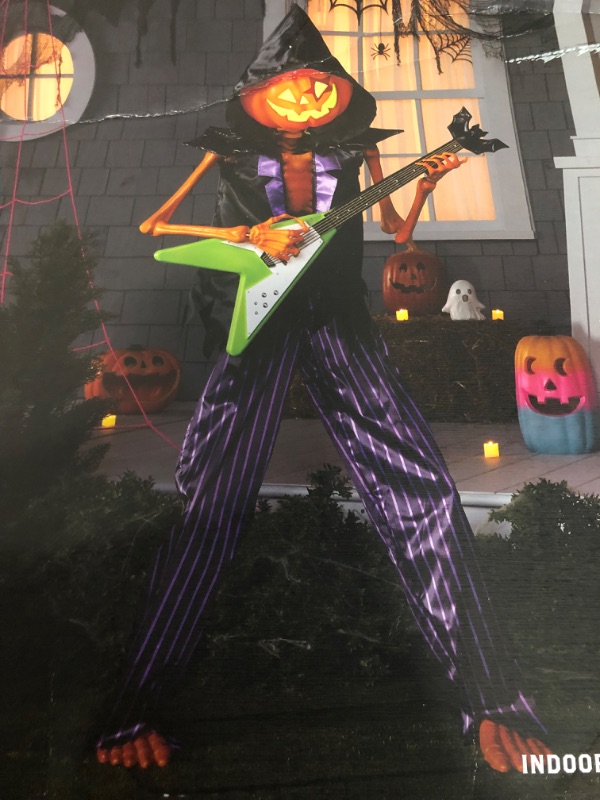 Photo 1 of Hyde and EEK 5.5" LED Sound and Motion Activated Pumpkin Rocker Decor