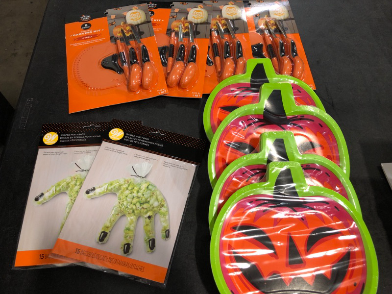 Photo 1 of Halloween Bundle 4 Carving Books, 3 Zombie Hand GoodieBag Packs and 4 Jack-O-Lantern Party Plates