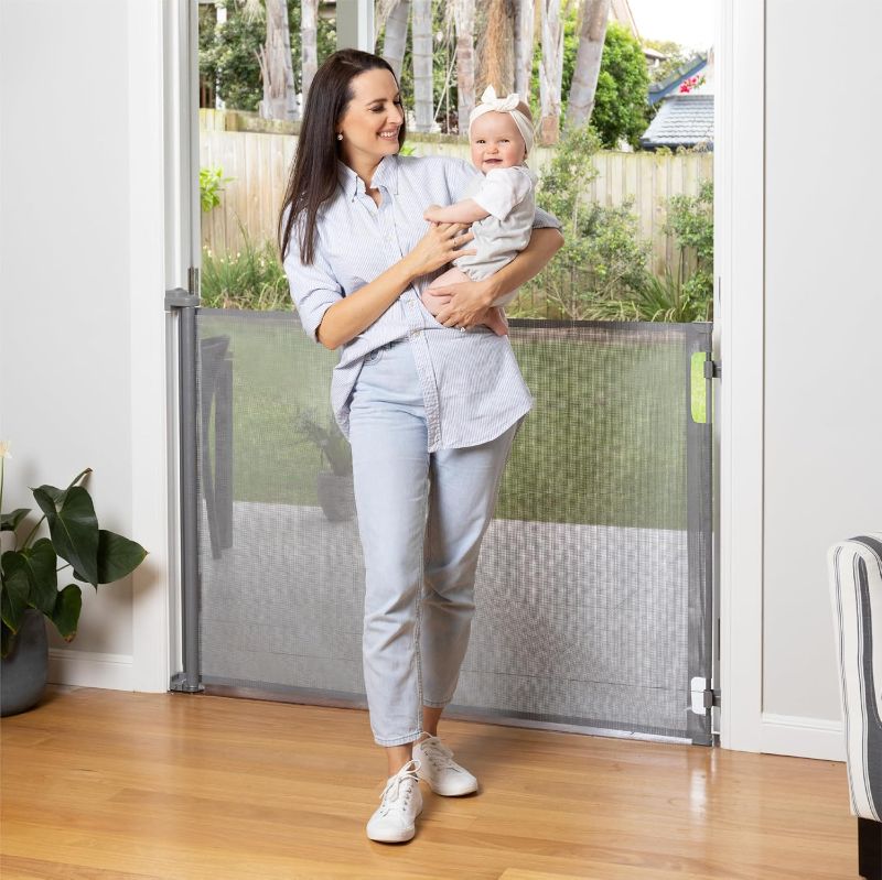 Photo 1 of Retractable Baby Gate Perma Child Safety 41" Tall x 71” Wide, Mesh, for Stairs, Doorways, Dogs, Pets, Indoor, Outdoor, One-Handed Operation, Locking, Easy Install, Hardware Mount, Gray