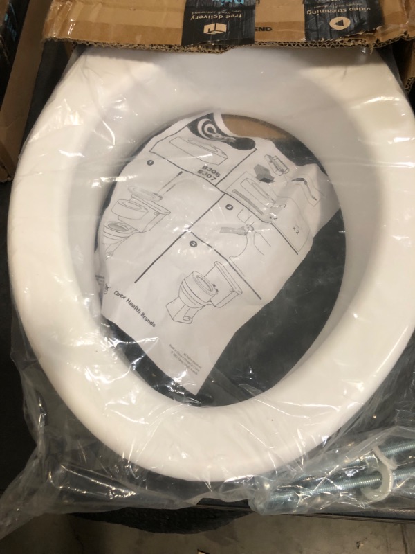 Photo 1 of Carex Elongated Hinged Toilet Seat Riser, Adds 3.5 Inches of Height to Toilet, 300 Pound Weight Capacity, Raised Toilet Seat