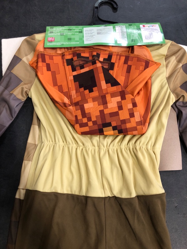 Photo 1 of Size M Minecraft Husk Jack O'Lantern Costume, Official Minecraft Hooded Jumpsuit Costume, Kids Size (7-8)