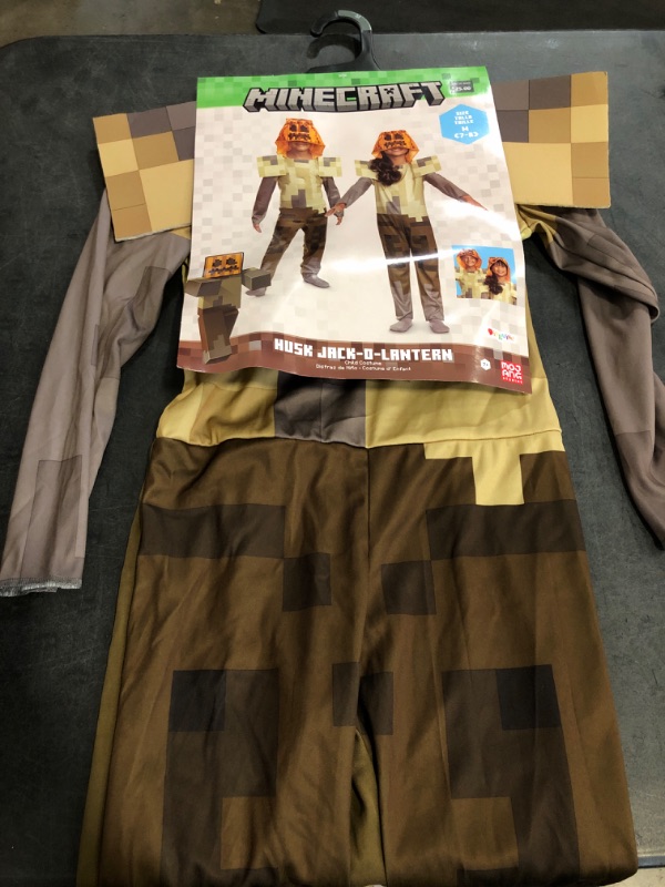 Photo 1 of Size M Minecraft Husk Jack O'Lantern Costume, Official Minecraft Hooded Jumpsuit Costume, Kids Size (7-8)