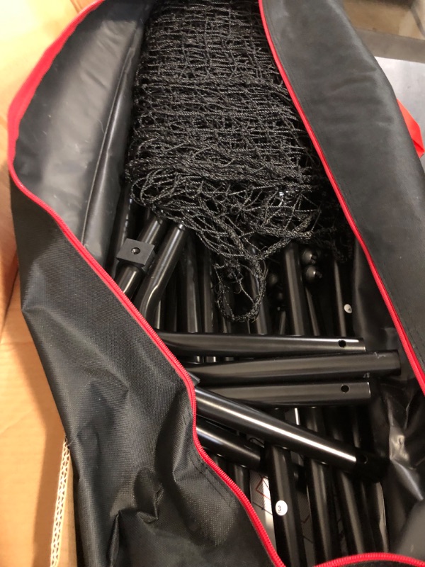 Photo 1 of Volleyball Rebounder Net with Bungee Cords, Volleyball,Carry Bag and Neon Target, Adjustable Bounce Back Net for Practicing Volleying, Bumping, Spiking (4x7ft)