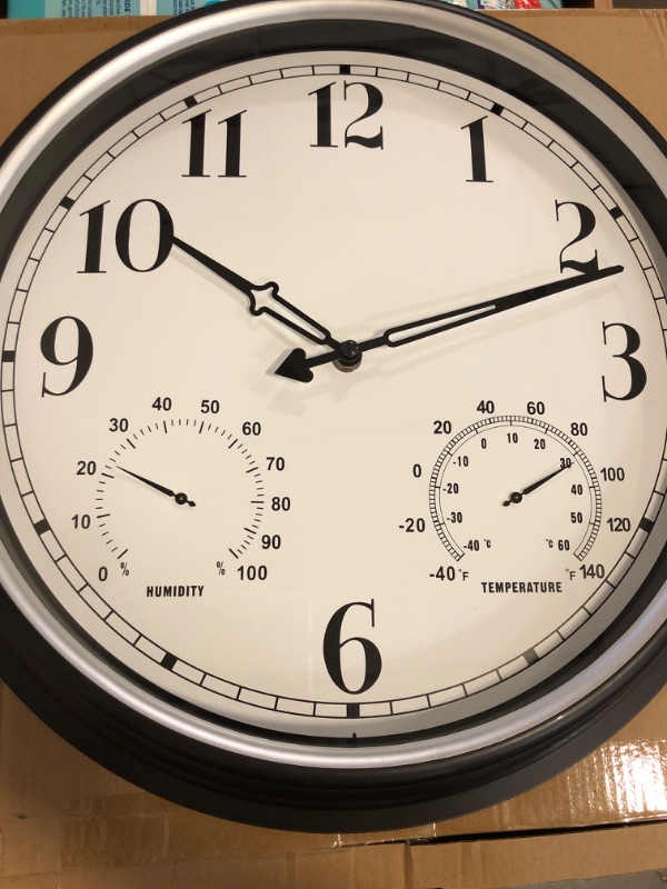 Photo 1 of Rsobl 16 Inch Large Indoor Outdoor Wall Clock,Waterproof Non-Ticking Clock with Thermometer and Hygrometer Combo,Battery Operated Clock Wall Decorative- Silver