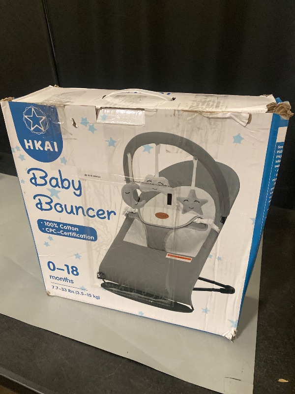 Photo 1 of HKAI Baby Bouncer, Portable Baby Bouncer Seat for Babies 0-18 Months, 100% Cotton Fabrics, 3 Modes of use with Rocker and Stationary Options, Infant Rocker Chair with Hanging Toys-Dark Grey
