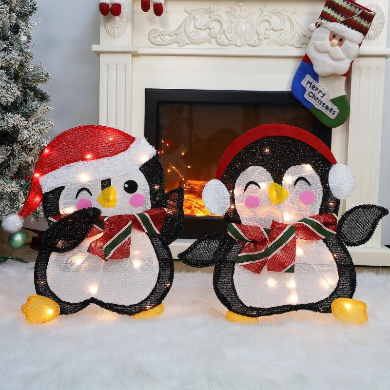 Photo 1 of Hausse Set of 2 Lighted Christmas Penguins Decorations, Pre-Lit 2D Tinsel Cute Penguin with Incandescent Lights, Light Up & Plug in for Indoor Outdoor Xmas Winter Holiday Yard Lawn Garden Decor
