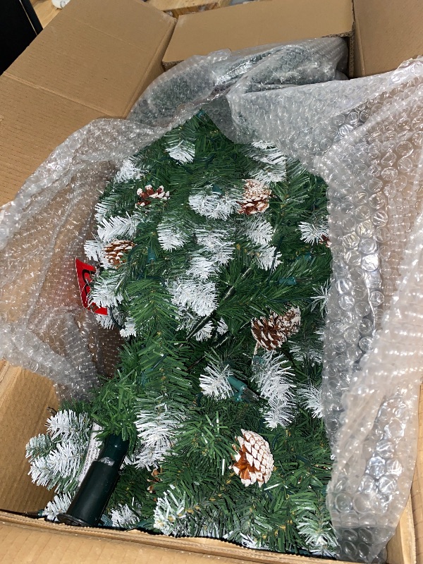 Photo 1 of Best Choice Products 6ft Pre-Decorated Holiday Christmas Tree for Home, Office, Party Decoration w/ 1,000 PVC Branch Tips, Partially Flocked Design, Pine Cones, Metal Hinges & Base