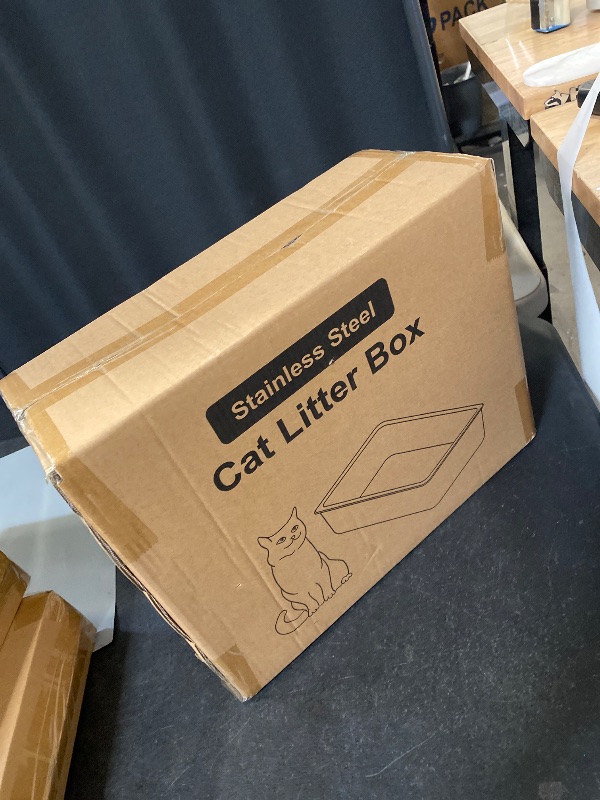 Photo 1 of Stainless Steel Cat Litter Box with High Sides, Extra Large Open Metal Litter Pan, Easy to Clean, Rust Proof, Non Stick, Non Slip Rubber Feets (18"x14"x4")

