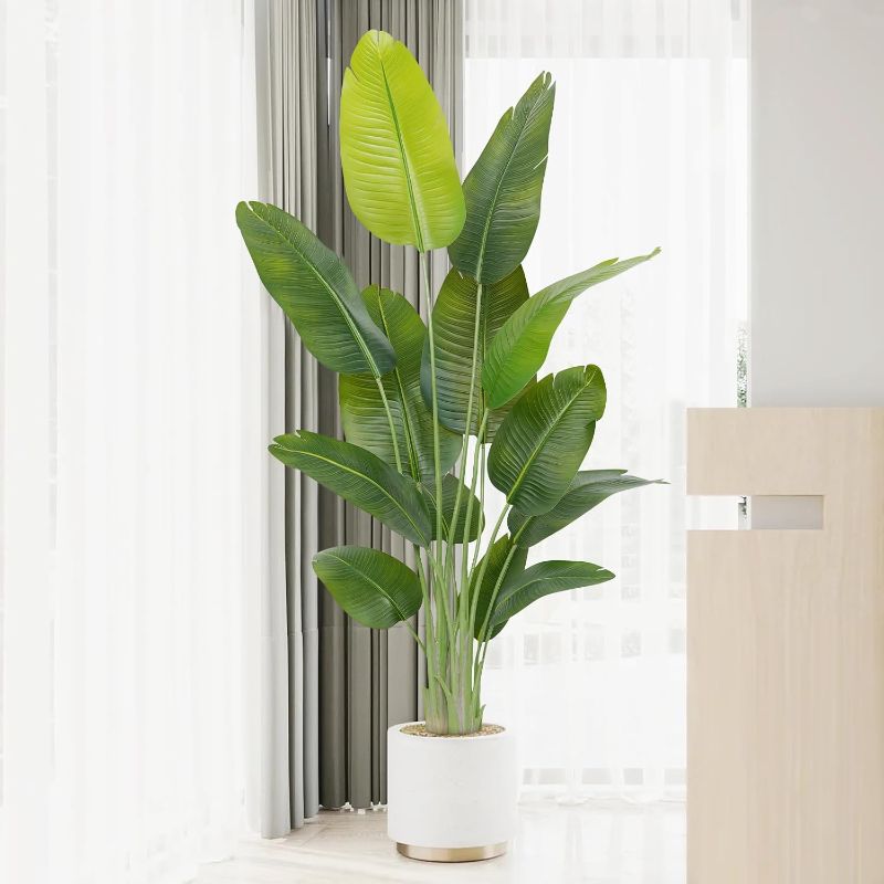 Photo 1 of Lifelike Bird of Paradise Artificial Plant,6ft Faux Banana Leaf Tree with 13 Trunks - Perfect Indoor Silk Floor Plant for Home Decor in Living Room, Office, and Bedroom 1Pack

