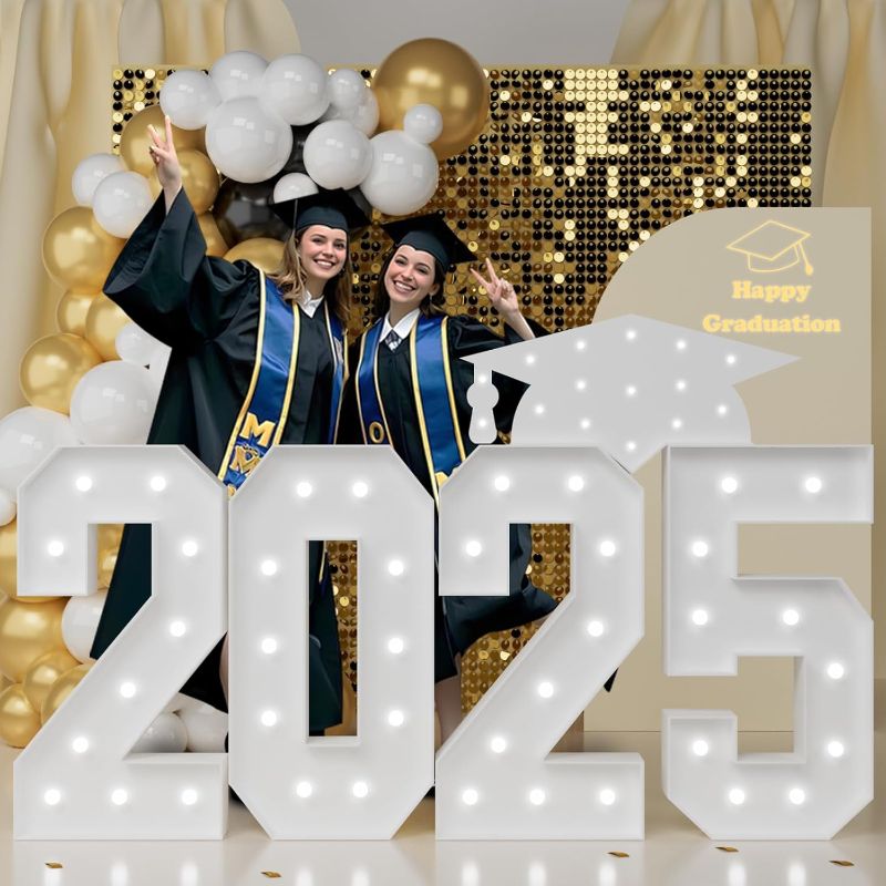 Photo 1 of Graduation Decorations Class of 2025: 4FT Large Marquee Numbers 2025 Graduation Party Decoration, Light Up Number Sign for Grad Ceremony of Preschool High School College White Foam Board Backdrop
