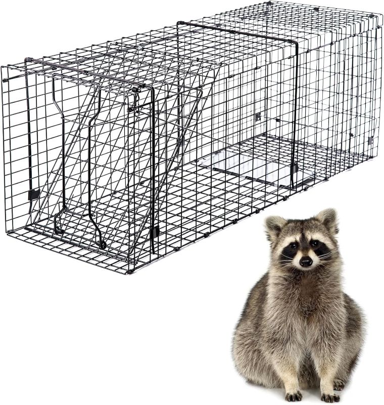 Photo 1 of Heavy Duty Live Trap 37x13x14.5 Inch Steel Collapsible with Humane Trap Release Door for Stray Cats, Raccoons, Skunks, Groundhogs, Armadillos and Other Live Animals.
