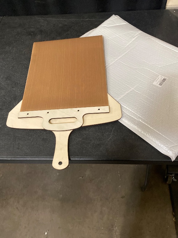Photo 1 of Sliding Pizza Peel, Magic Pizza Slider Paddle with Non-Stick Cloth, Easy Transfer Pizza Slider with Handle, 16 or 14 Inch Pizza Peel Slider for Oven, Elite Peel Pizza Making & Baking