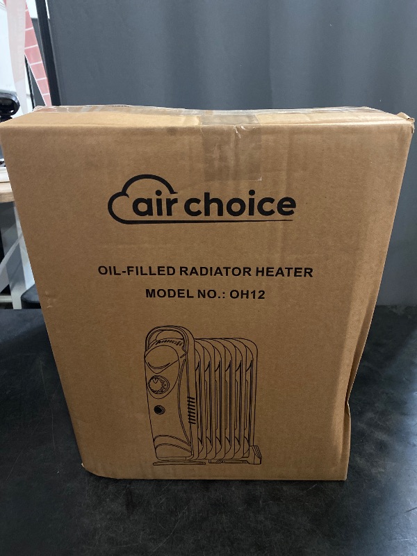 Photo 1 of Air Choice Oil Filled Radiator Heater, 700W With Adjustable Thermostat, Overheat Protection, Portable Mini Electric Space Heater, 2 Heat Settings, Quiet & Durable for Indoor Use
