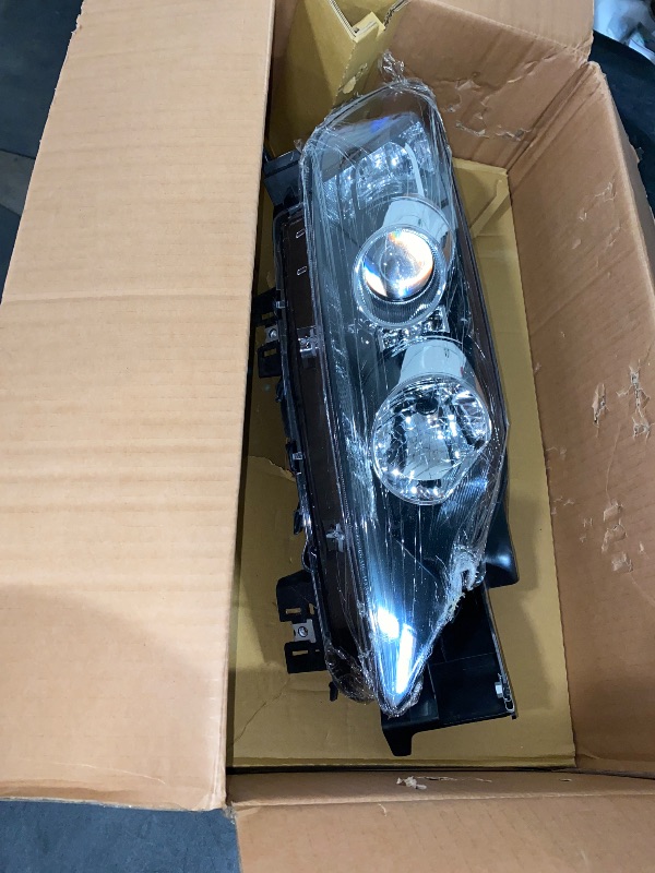 Photo 1 of TYC 20-6937-90-1 Compatible with MAZDA CX-7 Right Replacement Head Lamp
