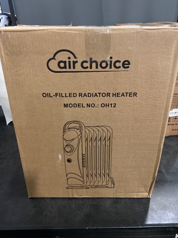 Photo 1 of Oil Filled Radiator Heater, 700W Electric Space Heater with Thermostat, Overheat Protection, Portable Oil Heater for Indoor Use, Quiet Indoor Portable Heater for Home and Office
