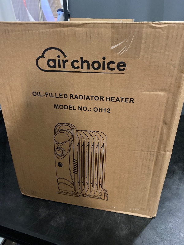 Photo 1 of Air Choice Oil Filled Radiator Heater, 700W With Adjustable Thermostat, Overheat Protection, Portable Mini Electric Space Heater, 2 Heat Settings, Quiet & Durable for Indoor Use
