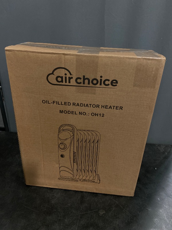 Photo 1 of Air Choice Oil Filled Radiator Heater, 700W With Adjustable Thermostat, Overheat Protection, Portable Mini Electric Space Heater, 2 Heat Settings, Quiet & Durable for Indoor Use
