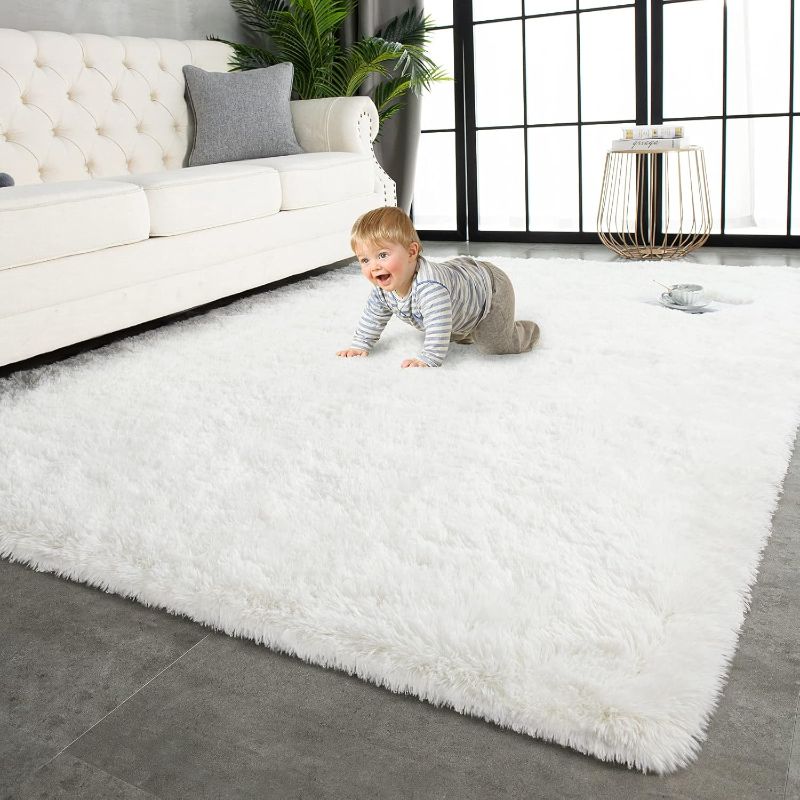 Photo 1 of TWINNIS Super Soft Shaggy Rugs Fluffy Carpets 5x8 Feet, Indoor Modern Plush Area Rugs for Living Room Bedroom Kids Room Nursery Home Decor, Upgrade Anti-Skid Rectangular Fuzzy Rug, Cream White
