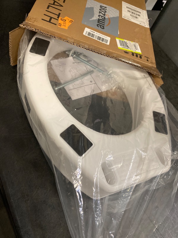 Photo 1 of Carex Toilet Seat Riser, Elongated Raised Toilet Seat Adds 3.5 inches to Toilet Height, for Assistance Bending or Sitting, 300 Pound Weight Capacity Toilet Riser