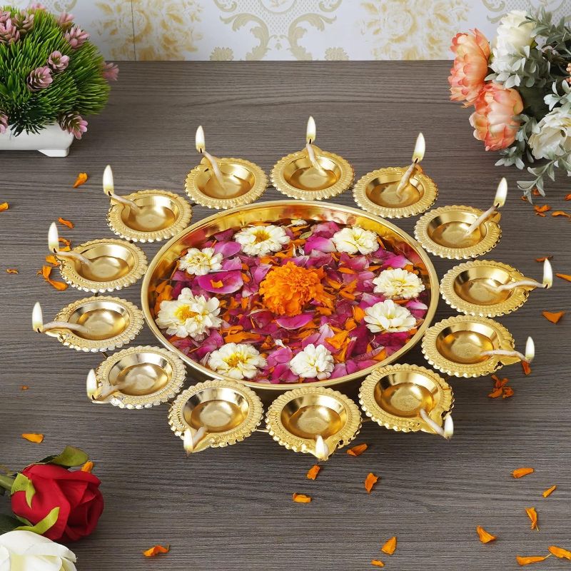 Photo 1 of Diya Shape Decorative Urli Bowl for Home Metal Handcrafted for Floating Flowers and Tea Light Candles Home,Office and Table Decor| (Gold Polish urli Bowl 14 inch)
