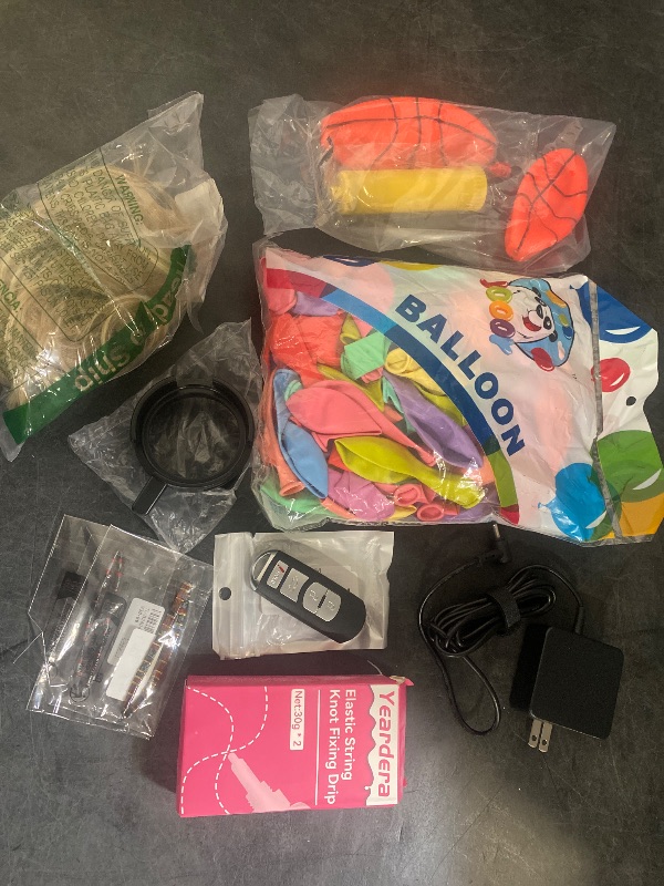 Photo 1 of LOT OF 8 MISCELLANEOUS ITEMS ( TOYS, CAR ALARM KEY, BEAUTY ACCESSORIES AND MORE)