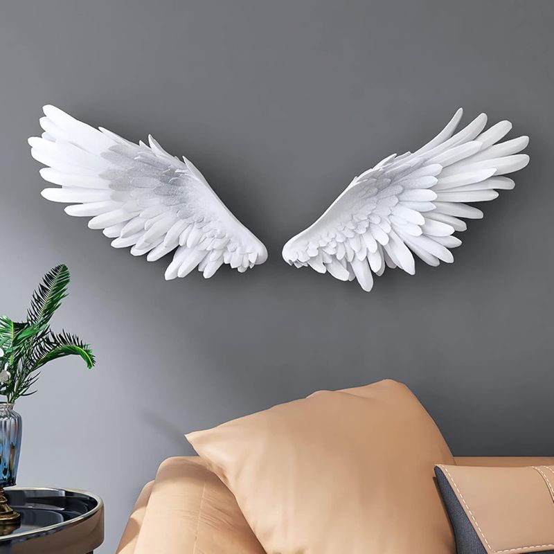 Photo 1 of SUN RDPP Angel Wings Wall Decor, 3D Large White Angels Wings Wall Sculptures Art Decor, Angel Wings Statue Ornament for Wall Living Room Bedroom
