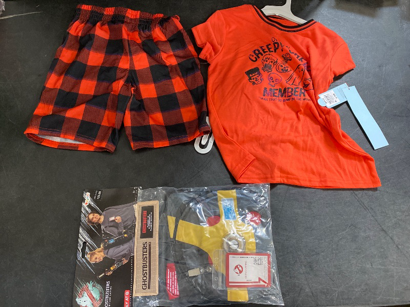 Photo 1 of Ghostbusters: Frozen Empire Kids' and Adult Halloween Accessory Kit One Size Fits Most: Includes Badge, Wand, Proton Pack + (S 6/7) Boys Orange Creepy Crew Halloween Sleep Set Pajamas Top & Shorts