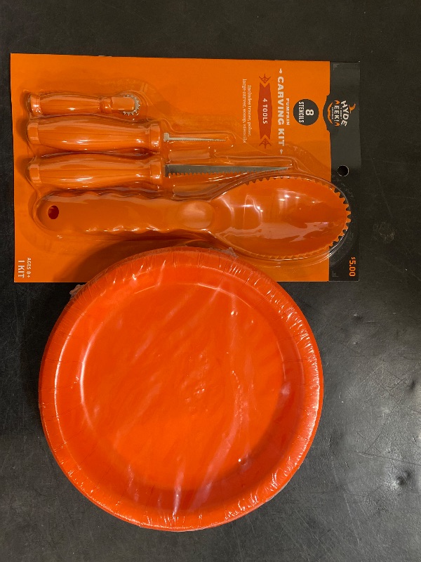 Photo 1 of Pumpkin Carving Party Kit - 8 Stencils and 4 Tools- Plus 20 count 8.5 inch Orange plates.