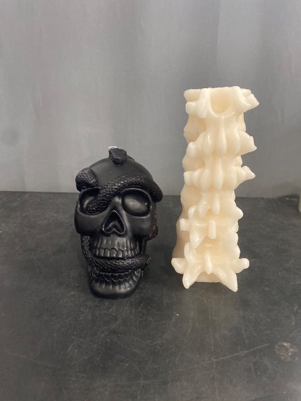 Photo 1 of 5.1' Skull and Snake Candle Black and Vertebrae Spine Bone Skeleton Candle - White