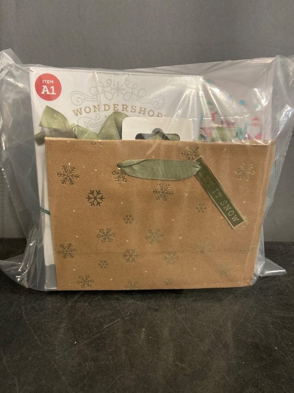 Photo 1 of 100ct LED Smooth Mini Christmas String Lights Warm White with Green Wire/ (2) Snowflakes Petite Vogue Christmas Gift Bag Brown/ 4ct Christmas Character Gift Box