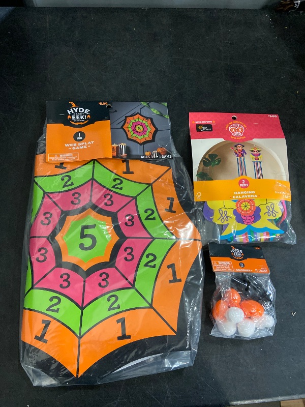 Photo 1 of 3pc Bundle Web splat game/ 12 count Squishes / 2 piece hanging calavera / (2) 6ct Vampire Fangs