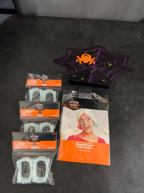 Photo 1 of 5Pc Misc. Halloween items. (3) 6ct Vampire Fangs - 1 Wig - 1 Placemat / Decor 