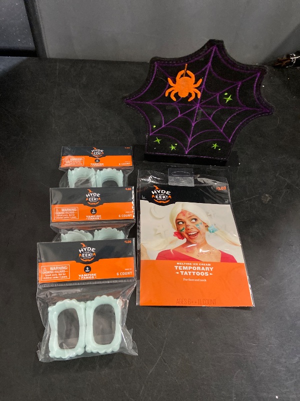 Photo 1 of 5Pc Misc. Halloween items. (3) 6ct Vampire Fangs - 1 Wig - 1 Placemat / Decor