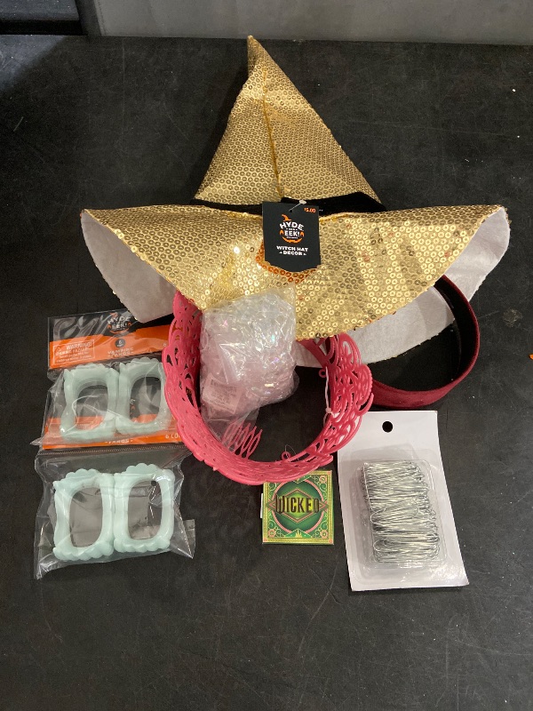 Photo 1 of 7pc Miscellaneous Items - 2 Packs of Vampire Teeth, 100pc Ornament Hooks, Wicked Tiara, Witch's Hat, Iridescent Wall Garland , & Headband