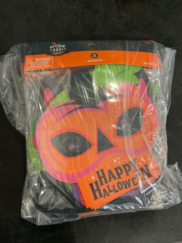 Photo 1 of (4) 24 count halloween masks.