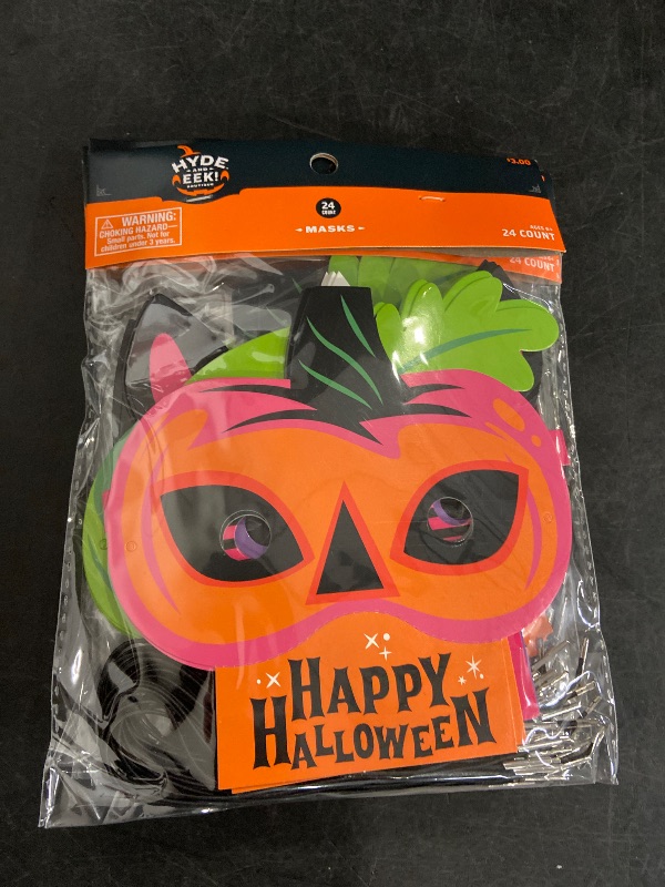 Photo 1 of (4) 24 count halloween masks.