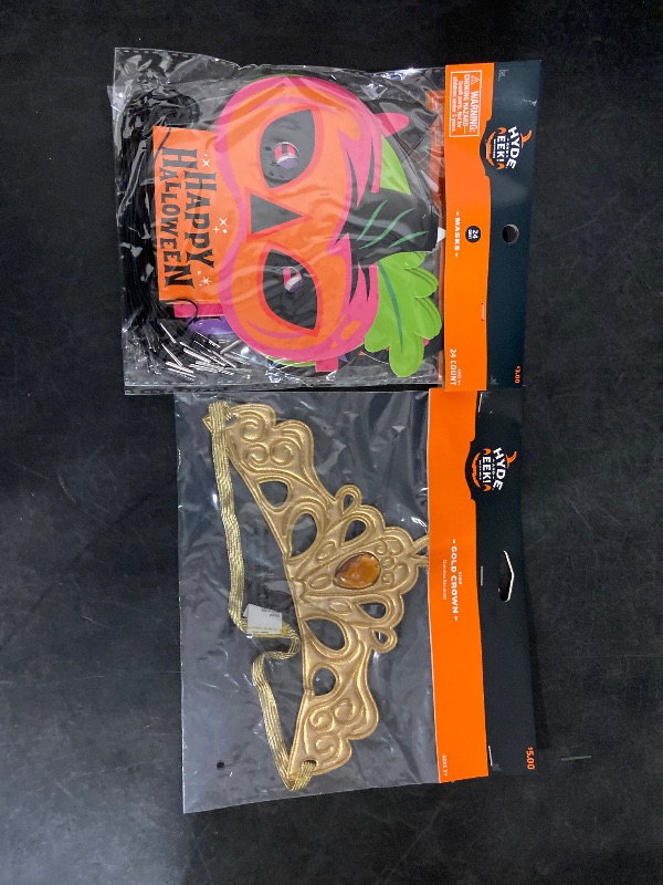 Photo 1 of 2- 24 cont halloween masks/ gold crown
