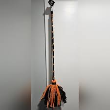 Photo 1 of Hyde and Eek-Kids Witch Broom-34in. Long From Top to Bottom-Orange & Black
